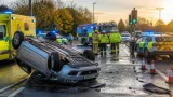 Car flips onto roof at busy Blackburn Road junction as emergency crews respond