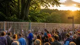 Community holds vigil as developer erects 2.4m fence around Finnamore Wood