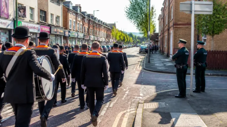 Belfast return parade at former Ardoyne flashpoint passes peacefully after Twelfth